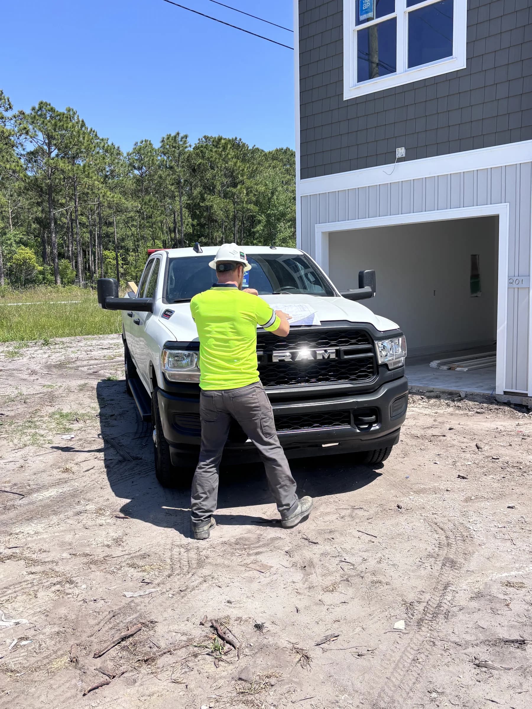 Truck and crew at a near-complete build